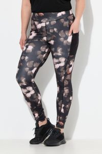 Damskie Legginsy sportowe szybkoschnące kieszenie z recyklingu. Czarne legginsy Ulla Popken, bez wzorów, z elastanu, z podwyższonym stanem. Za 191,99 zł.