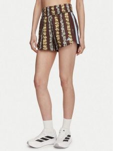 Adidas Szorty sportowe Farm Rio Pacer KR0229 Brązowy Loose Fit. Brązowe spodenki sportowe ADIDAS, l, bez wzorów, z syntetyku, na fitness i siłownię. Za 179,99 zł.