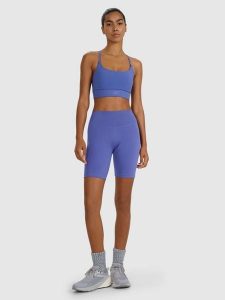 4F Legginsy kolarki treningowe damskie - granatowe XS. Niebieskie legginsy 4f, bez wzorów, z dzianiny, z podwyższonym stanem, krótkie. Za 99,99 zł.