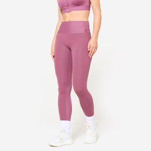 Legginsy fitness damskie Domyos. Fioletowe legginsy DOMYOS, bez wzorów, z materiału, z podwyższonym stanem. W wyprzedaży za 79,99 zł.