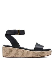 Clarks Skórzane sandały "Kimmei Ivy" w kolorze czarnym na koturnie rozmiar: 40. Czarne sandały Clarks, bez wzorów, z otwartym noskiem, bez obcasa, na koturnie, bez zapięcia. Za 161,73 zł.