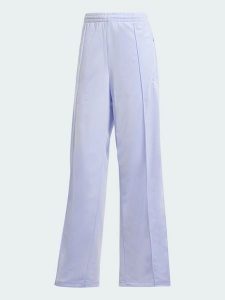 Adidas Spodnie dresowe "Firebird" w kolorze fioletowym rozmiar: M. Różowe spodnie dresowe ADIDAS, m, bez wzorów, z dresówki. Za 149,66 zł.