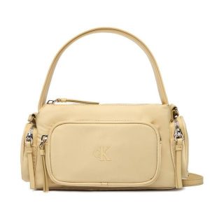 Torebka Calvin Klein. Żółte torebki klasyczne Calvin Klein, bez wzorów, z nylonu, bez dodatków. Za 449,99 zł.