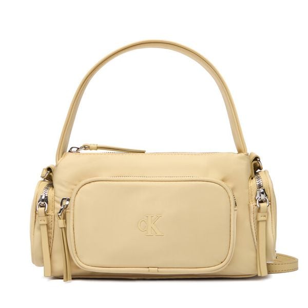 Torebka Calvin Klein. Żółte torebki klasyczne Calvin Klein, bez wzorów, z nylonu, bez dodatków. Za 277,99 zł.