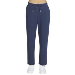 Spodnie sportowe damskie Slip-Ins: GO Walk Uptown Pant. Niebieskie spodnie dresowe Skechers, s, bez wzorów, z nylonu, trekkingowe. Za 199,99 zł.