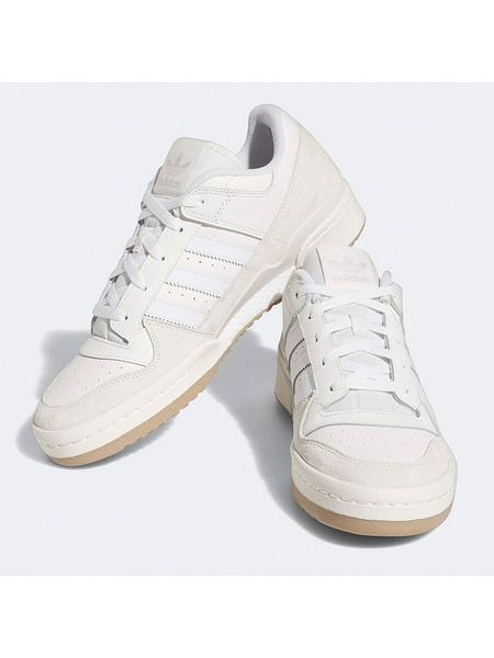 Adidas Skórzane sneakersy "Forum Low" w kolorze kremowym rozmiar: 38. Brązowe trampki ADIDAS, bez wzorów, bez zapięcia. Za 270,44 zł.