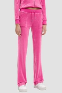 JUICY COUTURE Różowe damskie spodnie welurowe Del Ray Pocket Pant, Rozmiar S. Czerwone spodnie dresowe Juicy Couture, s, bez wzorów, z dresówki. Za 499,99 zł.