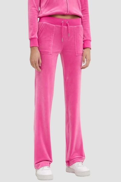 JUICY COUTURE Różowe damskie spodnie welurowe Del Ray Pocket Pant, Rozmiar M. Czerwone spodnie dresowe Juicy Couture, m, bez wzorów, z dresówki. W wyprzedaży za 260,99 zł.