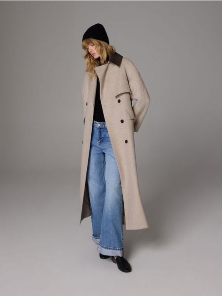 Wełniana czapka z dodatkiem kaszmiru - czarny. Czarne czapki Reserved, bez wzorów, z kaszmiru. W wyprzedaży za 55,99 zł.