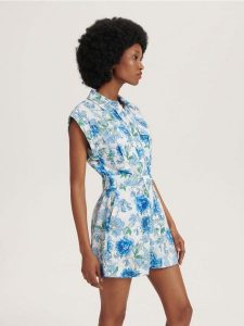 Wzorzysty kombinezon z lnem - niebieski. Niebieskie kombinezony Reserved, l, bez wzorów, z bawełny, klasyczne, bez kołnierzyka, bez ramiączek. W wyprzedaży za 89,99 zł.