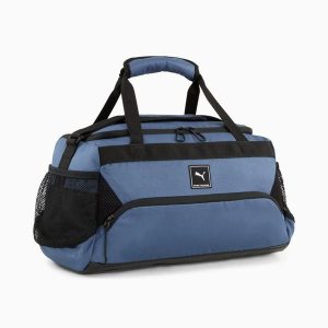 Torba treningowa Puma TRAINING SMALL SPORTS 09091904. Niebieskie torby podróżne i sportowe Puma, bez wzorów, małe. Za 141,91 zł.