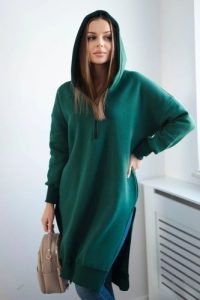 Bluza ocieplana z rozcięciami na bokach ciemno zielona. Zielone bluzy KESI, l, bez wzorów, z bawełny, bez kaptura. Za 284,37 zł.