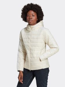Adidas Kurtka zimowa w kolorze kremowym rozmiar: 36. Brązowe kurtki ADIDAS, na zimę, s, bez wzorów, z materiału, bez kaptura. Za 202,03 zł.