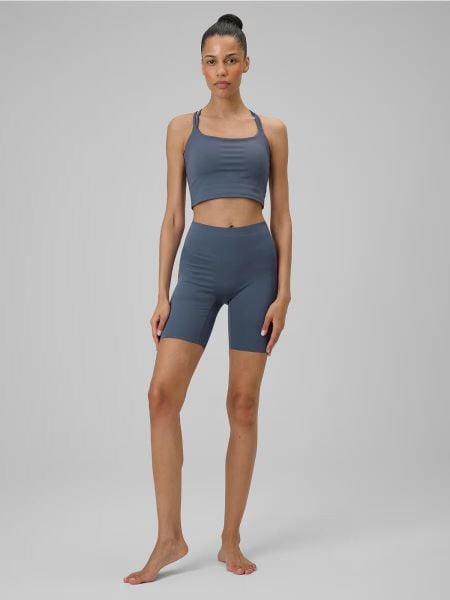 Legginsy krótkie treningowe z wysokim stanem damskie. Niebieskie legginsy 4f, bez wzorów, z dzianiny, z podwyższonym stanem, krótkie. Za 139,99 zł.