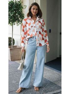 LA Angels Bluzka w kolorze kremowym rozmiar: M. Brązowe bluzki LA Angels, m, bez wzorów, z wiskozy, bez kołnierzyka, bez ramiączek. Za 105,14 zł.