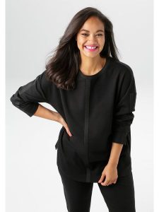 Aniston Koszulka w kolorze czarnym rozmiar: 44. Czarne bluzki Aniston, bez wzorów, bez kołnierzyka, bez ramiączek. Za 78,47 zł.