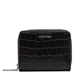 Portfel Calvin Klein. Czarne portfele Calvin Klein, bez wzorów. Za 299,99 zł.