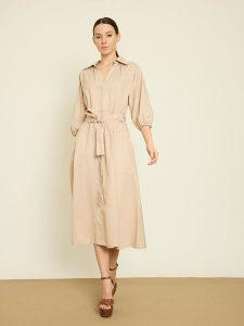 BGN Sukienka w kolorze beżowym rozmiar: 34. Brązowe sukienki BGN, na co dzień, bez wzorów, z tkaniny, bez kołnierzyka, bez ramiączek, midi, proste. Za 143,99 zł.