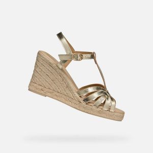 Sandały GEOX D GELSA Złoty. Żółte sandały Geox, bez wzorów, ze skóry, bez obcasa, bez zapięcia. Za 434,99 zł.