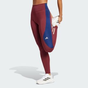 Legginsy Own The Run Colorblock Full-Length. Czerwone legginsy ADIDAS, bez wzorów, z materiału. W wyprzedaży za 216,75 zł.