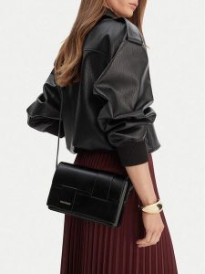 GINO ROSSI Torebka C-KY185 Czarny. Czarne listonoszki Gino Rossi, bez wzorów, z materiału, bez dodatków. Za 179,99 zł.