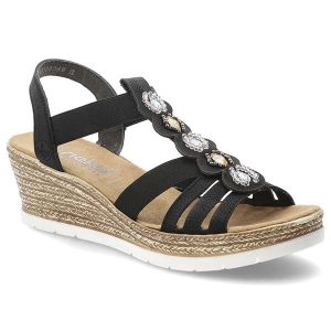 Sandały damskie Rieker, cholewka z materiału tekstylnego i skóry ekologicznej z ozdobnymi aplikacjami, czarne, 619B2-00. Czarne sandały Rieker, z aplikacjami, ze skóry ekologicznej, bez obcasa, na koturnie, bez zapięcia. Za 319,00 zł.