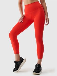4F Legginsy sportowe w kolorze czerwonym rozmiar: L. Czerwone legginsy 4f, l, bez wzorów, z materiału, outdoorowe. Za 61,31 zł.