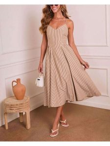 Milan Kiss Sukienka w kolorze beżowym rozmiar: M. Brązowe sukienki Milan Kiss, na imprezę, m, bez wzorów, bez kołnierzyka, bez ramiączek, midi. Za 204,95 zł.