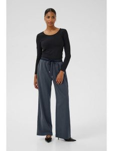 Kaffe Spodnie w kolorze niebieskim rozmiar: 36. Niebieskie spodnie z wysokim stanem Kaffe, bez wzorów, z materiału, z podwyższonym stanem. Za 173,99 zł.