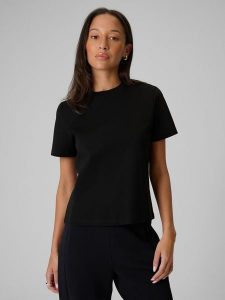 4F T-shirt regular gładki damski - czarny L. Czarne t-shirty 4f, l, bez wzorów, z materiału, bez kołnierzyka, bez ramiączek. Za 79,99 zł.