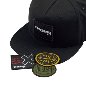 Czapka z daszkiem dla dorosłych THORN FIT Patch Snapback. Czarne czapki THORN FIT, bez wzorów. Za 89,90 zł.