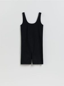 Prążkowany kombinezon - czarny. Czarne kombinezony Reserved, l, bez wzorów, z dzianiny, bez kołnierzyka, bez ramiączek. Za 99,99 zł.