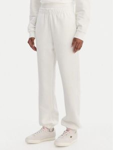 Lacoste Spodnie dresowe XF5244 Écru Regular Fit. Białe spodnie dresowe Lacoste, bez wzorów, z bawełny. Za 439,99 zł.