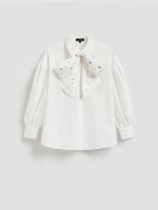 Koszula z wiązaniem - biały. Białe koszule Reserved, l, bez wzorów, z bawełny, bez kołnierzyka, bez ramiączek. Za 179,99 zł.