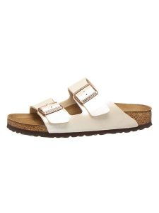 Birkenstock Klapki "Arizona" w kolorze kremowym rozmiar: 36. Brązowe klapki Birkenstock, bez wzorów, z otwartym noskiem, bez obcasa. Za 324,95 zł.