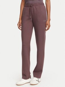 Guess Spodnie dresowe V6YB25 K4803 Brązowy Regular Fit. Brązowe spodnie dresowe Guess, m, z aplikacjami, z dresówki. Za 344,99 zł.
