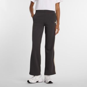 Spodnie damskie New Balance WB61Q2R4ABR – szare. Szare spodnie sportowe New Balance, l, bez wzorów, z dresówki, z podwyższonym stanem. Za 279,99 zł.