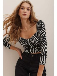 Happiness Istanbul Bluzka w kolorze czarnym rozmiar: L. Czarne bluzki Happiness Istanbul, l, bez wzorów, bez kołnierzyka, bez ramiączek. Za 39,99 zł.