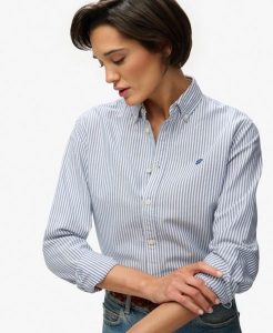 Superdry Damska koszula Oxford slim z długim rękawem – AZURE BLUE STRIPE OXFORD. Niebieskie koszule Superdry, bez wzorów, z bawełny, bez kołnierzyka, bez ramiączek. Za 287,35 zł.