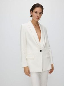 Marynarka z szalowym kołnierzem - biały. Białe marynarki i żakiety Reserved, l, bez wzorów, z tkaniny. W wyprzedaży za 119,99 zł.