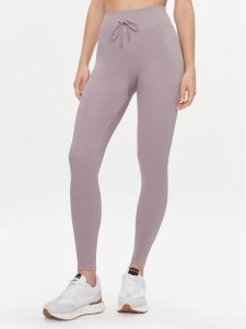 Guess Legginsy Rib-Seamless V4RB00 Z3CC0 Fioletowy Slim Fit. Fioletowe legginsy Guess, z aplikacjami, z syntetyku. Za 399,99 zł.