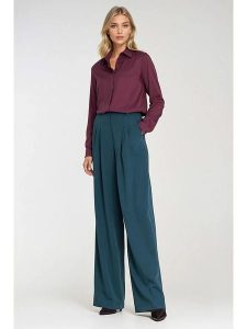 Nife Spodnie w kolorze niebieskim rozmiar: 42. Niebieskie spodnie z wysokim stanem Nife, bez wzorów, z materiału, z podwyższonym stanem. Za 169,67 zł.