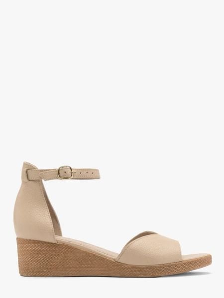 Beżowe sandały na platformie. Brązowe sandały Ryłko, bez wzorów, z gumy, bez obcasa, na platformie, bez zapięcia. W wyprzedaży za 199,99 zł.