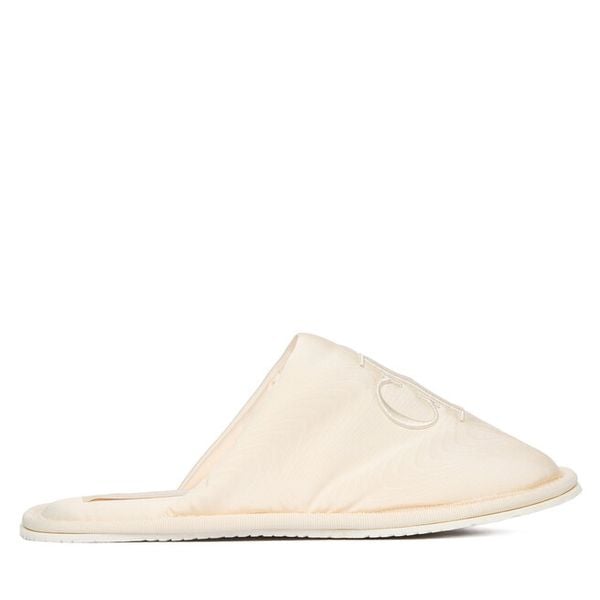 Kapcie Calvin Klein Jeans. Kapcie Calvin Klein Jeans, bez wzorów, z jeansu. Za 209,99 zł.