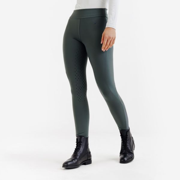 Legginsy jeździeckie damskie full grip - 500 zielone. Zielone legginsy FOUGANZA, bez wzorów, z lycry, z podwyższonym stanem. Za 169,99 zł.