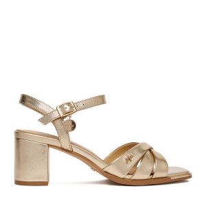 Sandały MEXX. Żółte sandały Mexx, bez wzorów, bez obcasa, na słupku, bez zapięcia. Za 329,99 zł.