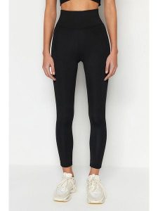 Trendyol Legginsy sportowe w kolorze czarnym rozmiar: XL. Czarne legginsy Trendyol, bez wzorów, z materiału, z podwyższonym stanem. Za 79,03 zł.