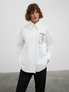 BGN Koszula w kolorze białym rozmiar: 38. Białe koszule BGN, bez wzorów, bez kołnierzyka, bez ramiączek. Za 141,45 zł.