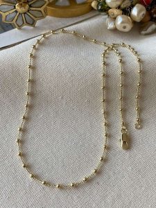 Luseera Pozłacany naszyjnik z elementami ozdobnymi - dł. 45 cm rozmiar: onesize. Żółte naszyjniki Luseera, pozłacane. Za 43,99 zł.