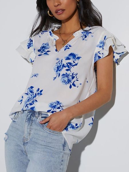 Milan Kiss Bluzka w kolorze biało-niebieskim rozmiar: L. Białe bluzki Milan Kiss, l, bez wzorów, bez kołnierzyka, bez ramiączek. Za 123,25 zł.